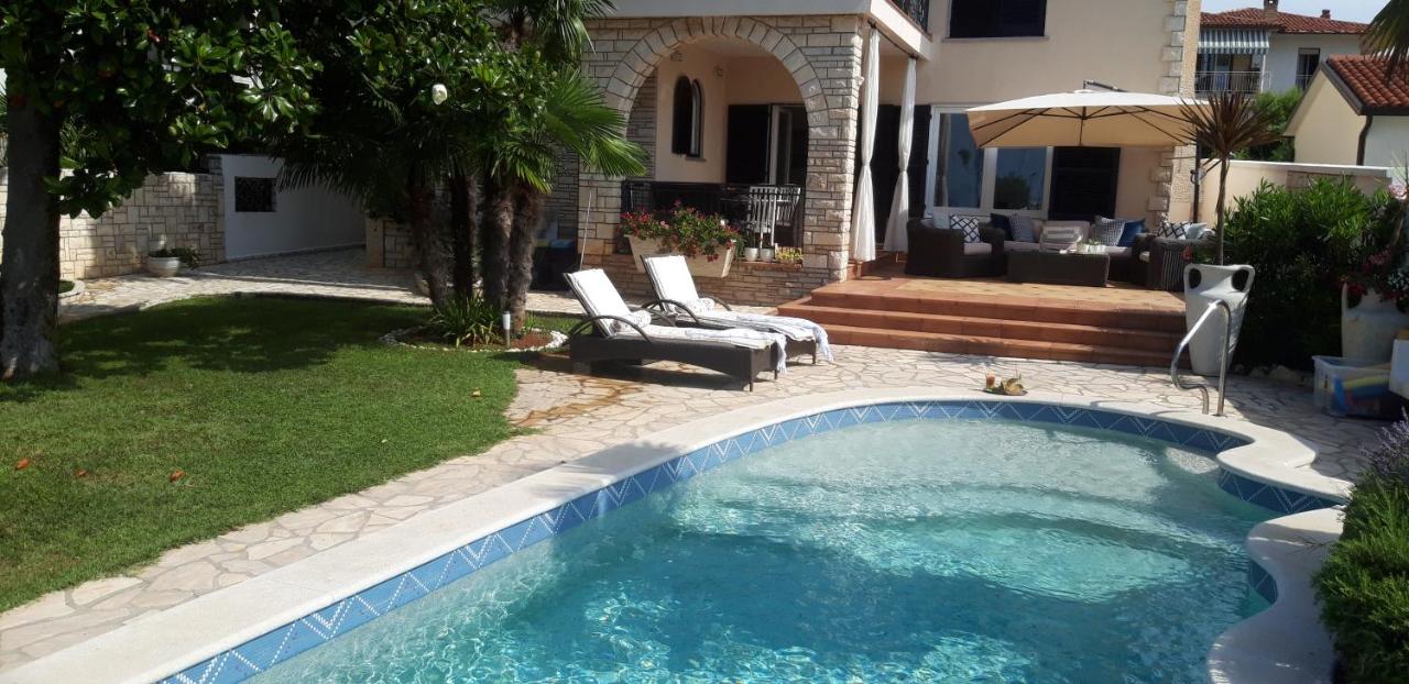 Seafront house in Istria, Umag, garage, pool, Croatia for sale