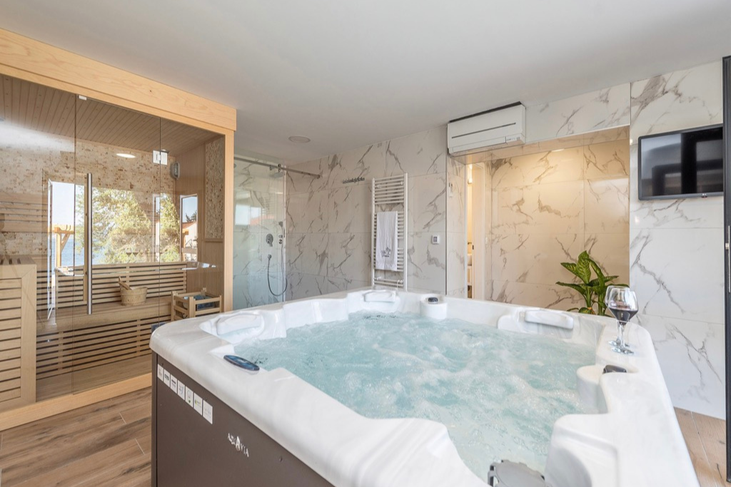 luxury villa with hot tub and sauna