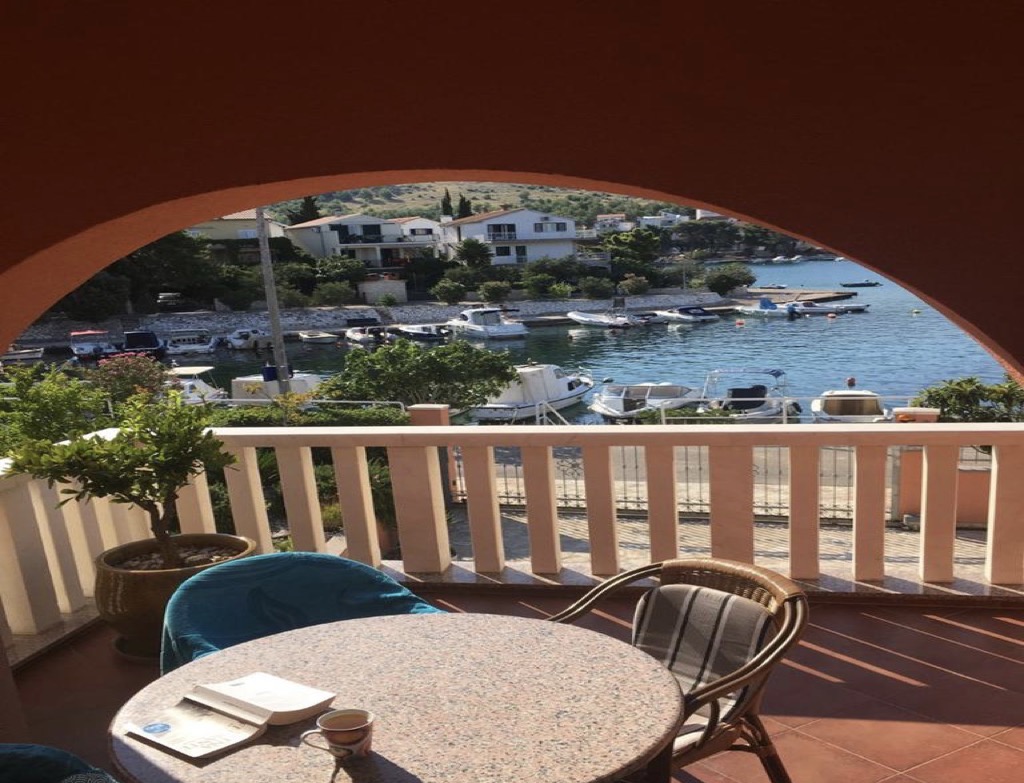 Seafront house for sale in Sibenik, waterfront with boat dock